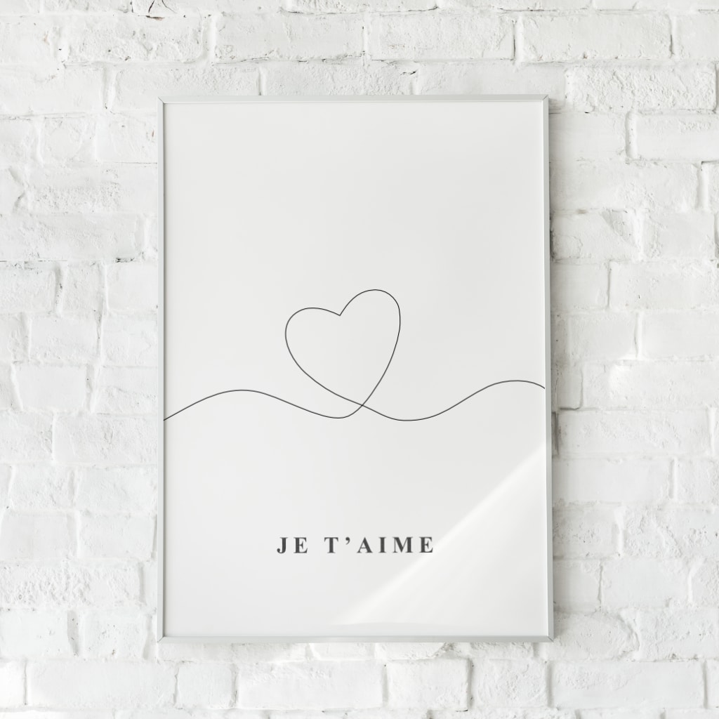 Minimalistisk plakat med et enkelt hjerte og teksten "Je t'aime".