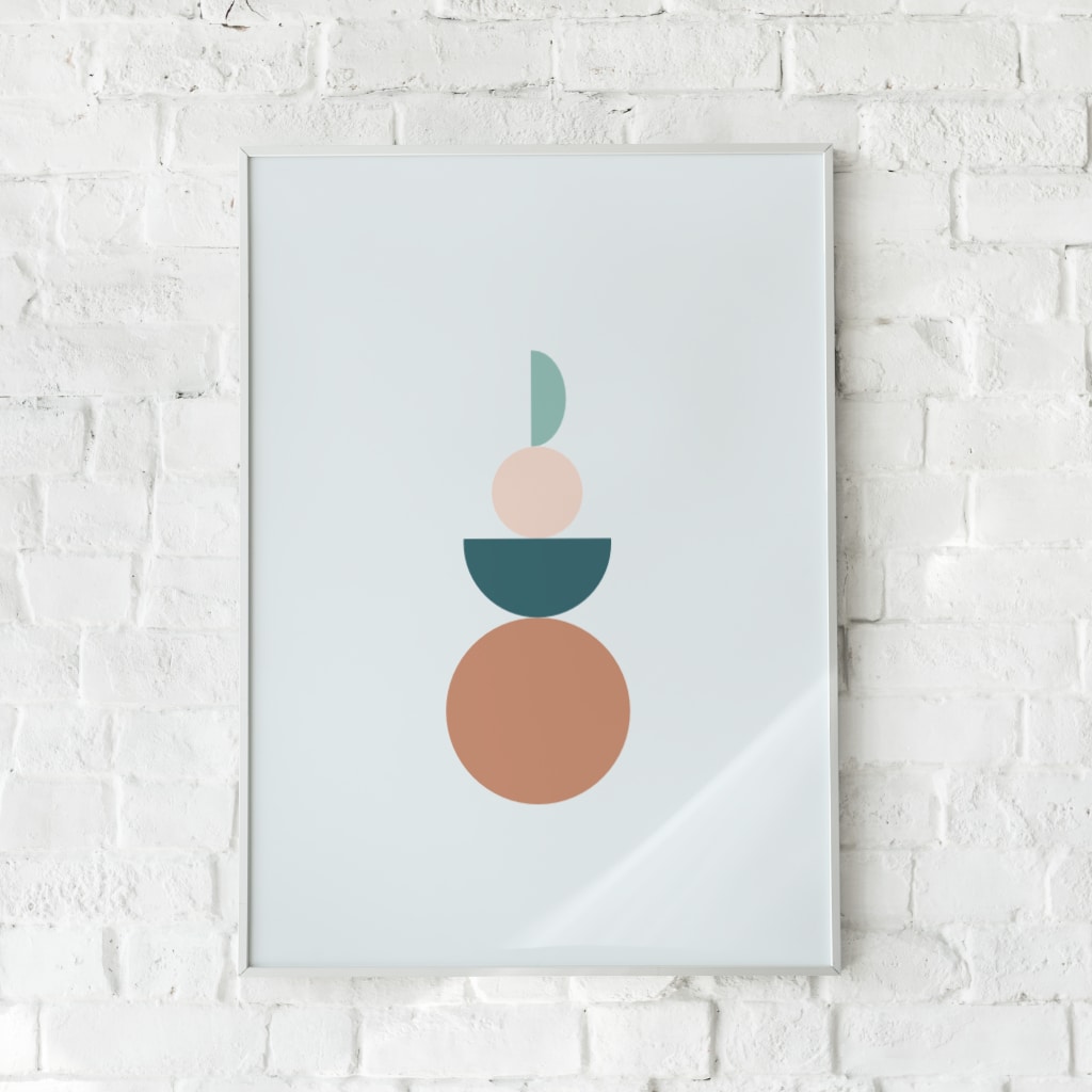 Geometrisk plakat med enkle cirkulære former i varme nuancer.
