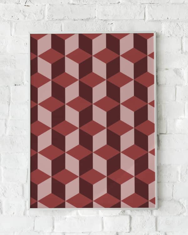 Geometrisk plakat med tredimensionelt kubemønster i røde og lyserøde nuancer.