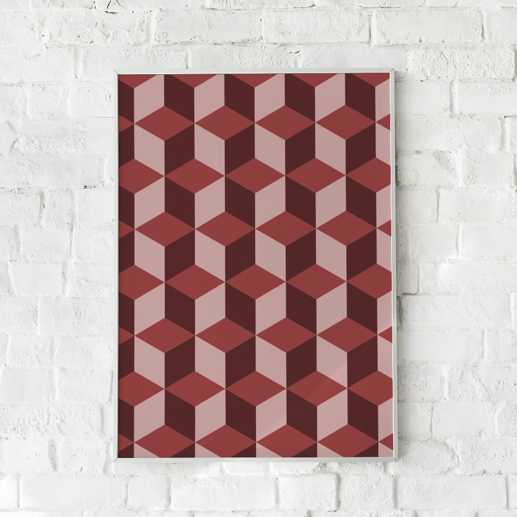 Geometrisk plakat med tredimensionelt kubemønster i røde og lyserøde nuancer.