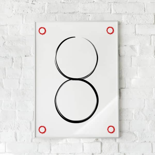 Minimalistisk plakat med to sorte cirkler og røde detaljer. Skaber balance og fokus.
