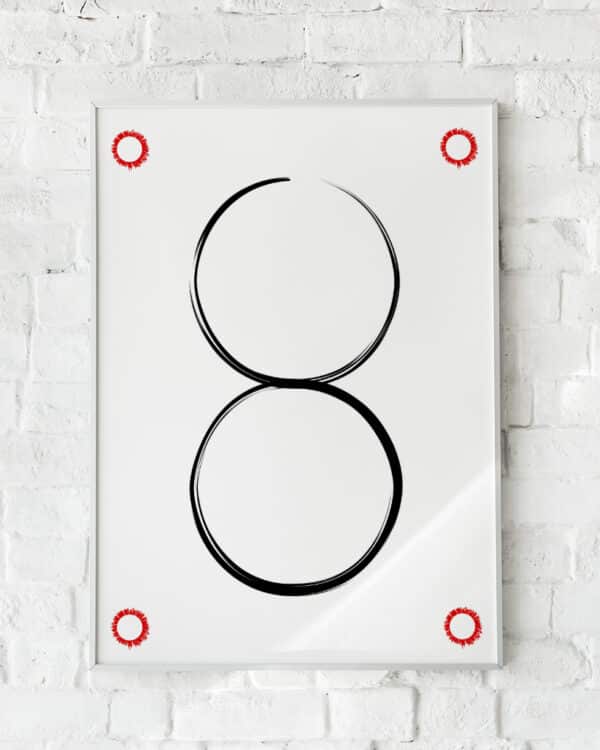 Minimalistisk plakat med to sorte cirkler og røde detaljer. Skaber balance og fokus.