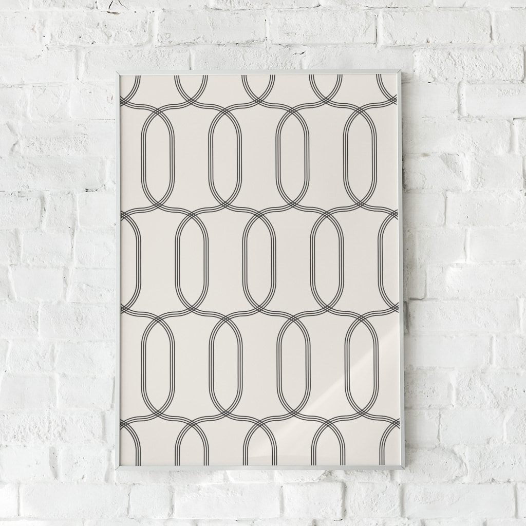 Geometrisk plakat med symmetriske ovale former i sort og creme.