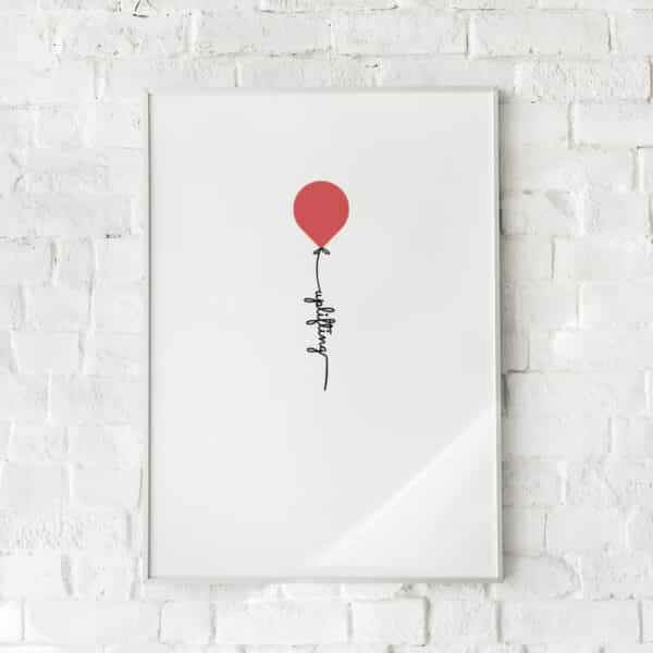 Minimalistisk plakat med en rød ballon og inspirerende budskab.