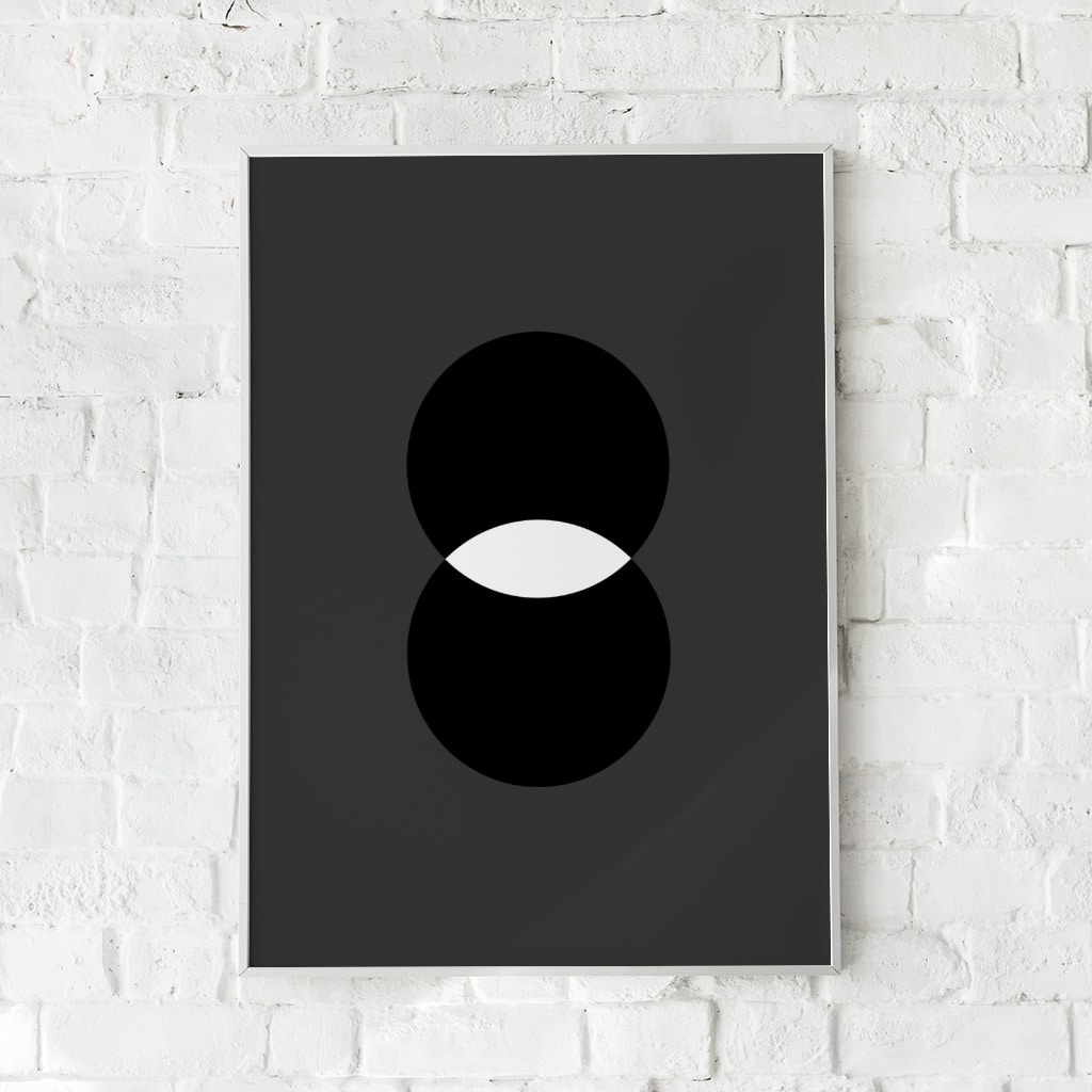Minimalistisk plakat med sorte cirkler og en hvid kontrast. Et tidløst design