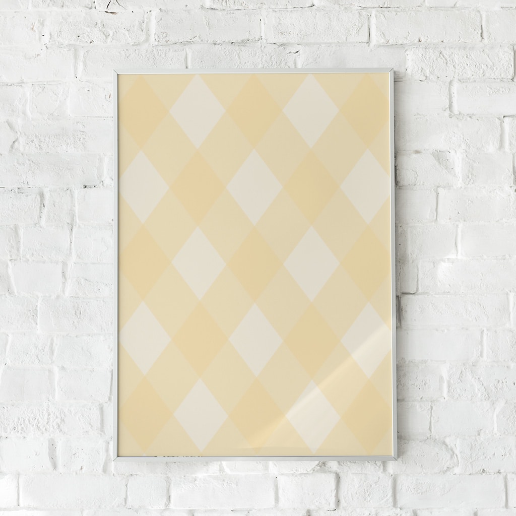 Plakat med geometrisk mønster i gule og beige nuancer.
